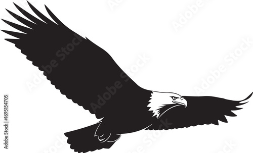 Majestic bald eagle soars across the sky spreading its enormous wings in a powerful display of freedom and natures beauty making it an icon of strength and resilience
