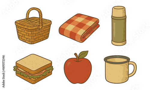 Cozy picnic essentials with rustic style basket, blanket, and snacks