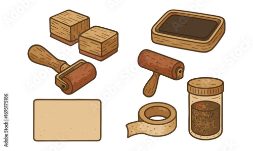 Vintage printmaking tools with textured rollers and ink