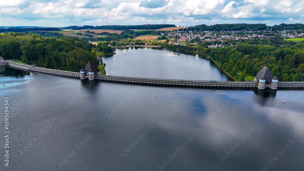 Fototapeta premium Aerial drone view of a huge stone dam on the lake Monetalsperre - Spermauer, Germany