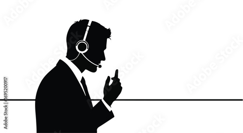 Silhouette of man wearing headset and suit, speaking into microphone with focus