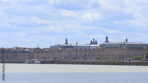 Buildings of the Place de la Bourse and Garonne river on a summer day in Bordeaux, France