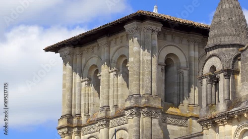 Bell tower of Sainte-Croix church in Bordeaux, France on a summer day