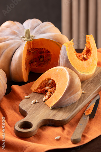 Cut Musquee De Provence Pumpkin On Kitchen Table