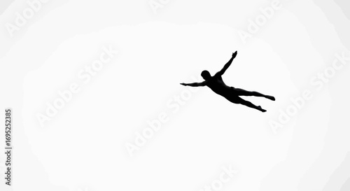 Silhouette of a person mid-air against a stark white background portraying freedom and liberation