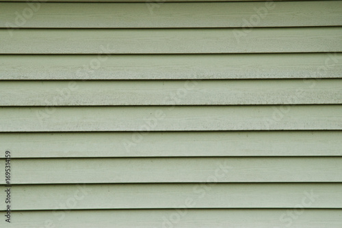 Painted green siding