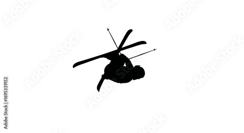 Silhouette of airborne skier executing an acrobatic trick during winter sports activity