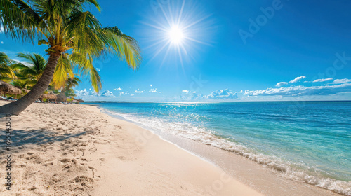 Fototapeta Naklejka Na Ścianę i Meble -  Vibrant Caribbean Beach Scene with Clear Blue Sky, Palm Trees, and Sparkling Ocean Waves Under Bright Sunlight