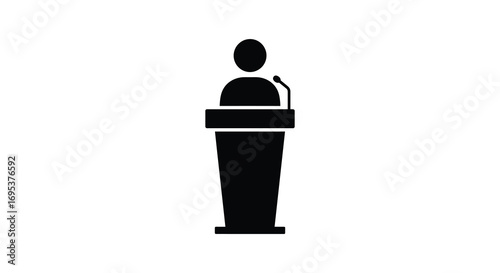 a person standing behind podium giving speech