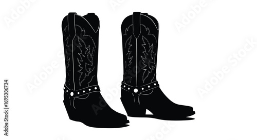 black cowboy boots with intricate designs and silver studs