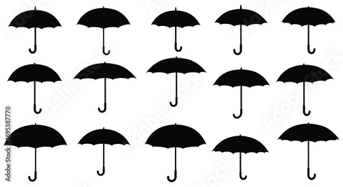 a grid of black umbrellas arranged neatly in rows