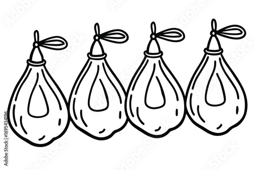 Four hanging punching bags boxing equipment sports gear