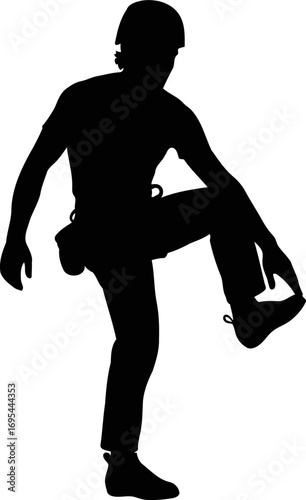 silhouette of a climber adjusting gear, a moment of focus before the ascent, isolated on transparent background