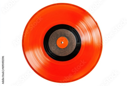 A vibrant orange vinyl record with black center on white background, top-down view, grooves visible