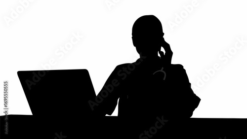 Silhouette of a doctor talking on the phone while working on a laptop in a bright white background scene