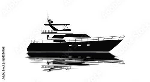 a sleek black yacht floating calmly on water surface