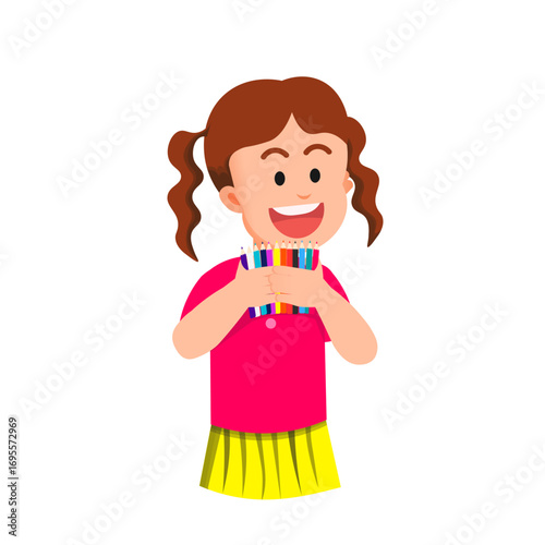 A smiling girl holds up colorful pencils