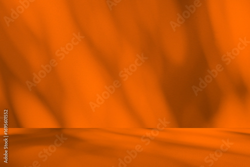 Wall interior background, studio  and backdrops show products.with shadow from window color orange background for text insertion and presentation product 