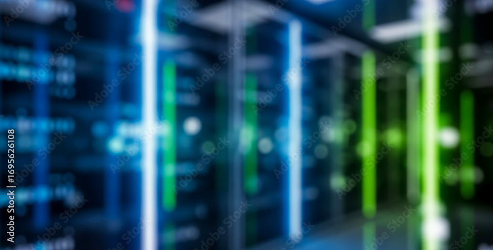 Obraz premium Blurred server room with blue and green lights representing data storage, evoking a futuristic digital network environment filled with technology, glowing energy, and abstract modern design.