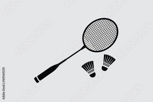 Black badminton racket and shuttlecocks on gray background sport game