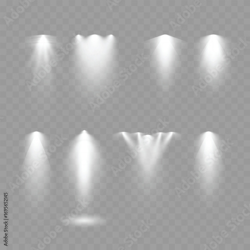 Set of realistic spotlight light effects on transparent background. Vector