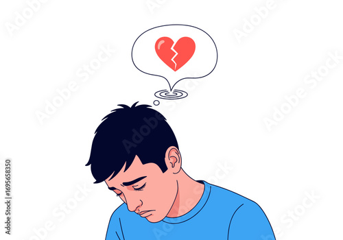 A young man looking down with sadness his thoughts are of a broken heart symbolizing heartbreak and emotional pain