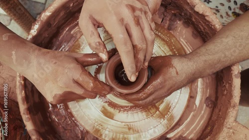 Shaping a Clay Pot in a Ceramics Workshop