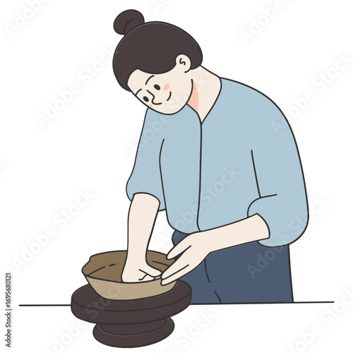 Young woman making pottery in art class