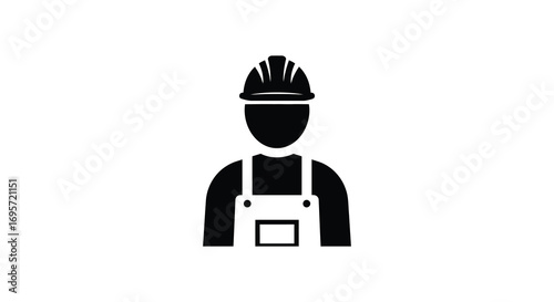 a worker wearing helmet and overalls standing upright