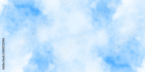 Blue sky with soft white clouds, natural background with fluffy cloudscape and clear atmosphere for peaceful design.