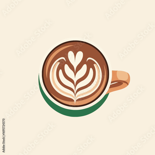 Overhead view of a coffee cup with latte art, featuring a heart and leaf design.
