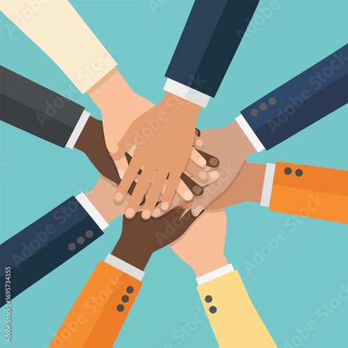 Diverse hands clasped together in a circle, symbolizing unity and teamwork.