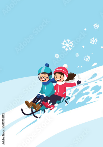 Two happy children enjoying a fun sledding ride down a snowy hill