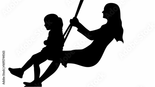 Silhouette of a woman and child on a swing with the woman holding the ropes in a black and white image