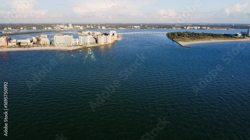 Wallpaper Mural From above, Clearwater Beach stretches beside calm Gulf waters, with a long bridge linking the shoreline to inland waterways and surrounding coastal communities. Torontodigital.ca