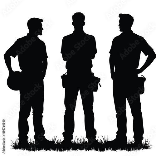Three construction workers in silhouette with hands on hips