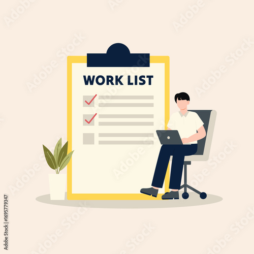 A focused male employee working on his laptop next to a large to-do list, symbolizing efficient project management and goal achievement