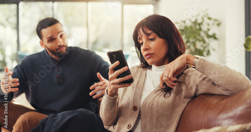 Slika na platnu Woman, phone and ignore man on couch with social media addiction, talk and gesture for attention