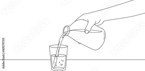 a hand pouring liquid from one glass into another