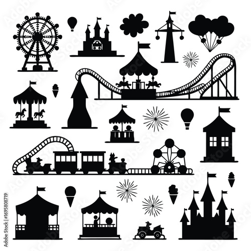 Amusement park attractions silhouettes with clouds and firework