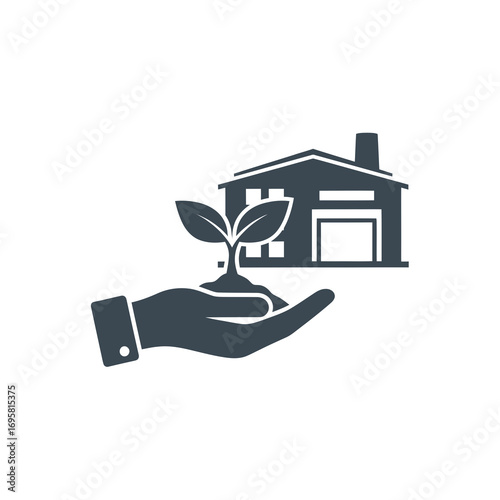 Nurturing growth from hand to home, symbolizing sustainable development and new beginnings.