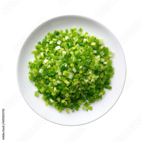 Chopped green onions on a white plate