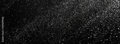 A mesmerizing display of sparkling particles against a dark background, creating a magical atmosphere