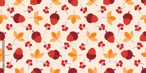 Autumn cozy print with acorns, leaves and rowan berries. Forest seamless pattern. Atmospheric fall season background with foliage, oak fruits and berries, vector graphic