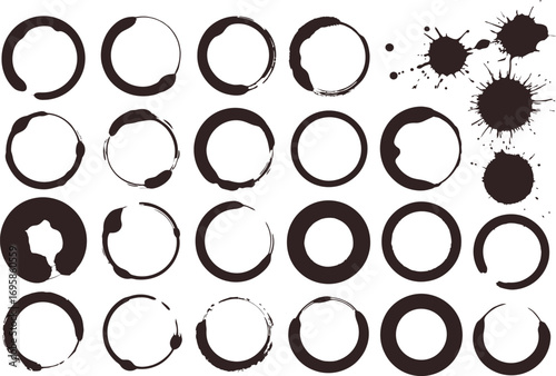 Collection of imperfect circular coffee cup stains and ink splatters on a neutral background