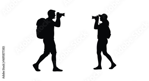two photographers capturing moments with cameras in hand