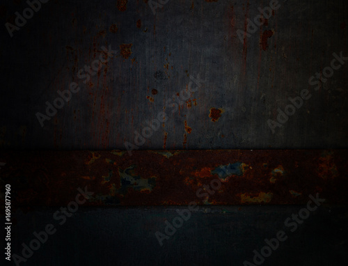Rusty metal texture and vignette with peeling paint and weathered surface. Grunge industrial background for vintage design, abstract art, and creative graphic elements