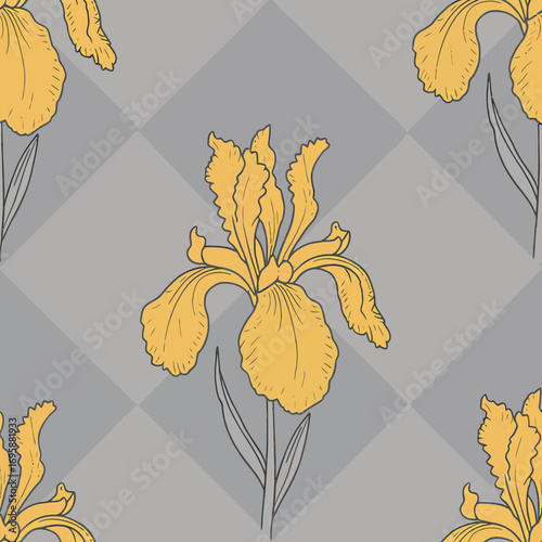Vibrant yellow iris flowers against a soft gray background.