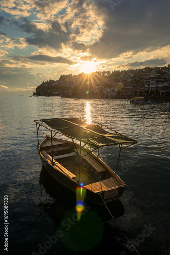 A small fishing boat and sunset on Lake Ohrid