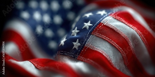 The American flag waves proudly in this detailed and patriotic image, showcasing its iconic design.